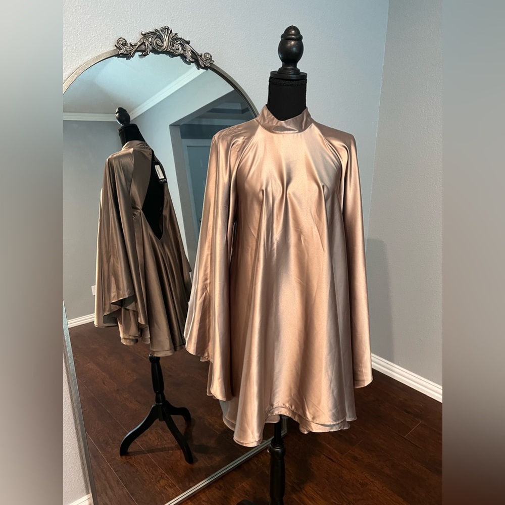 New- mini dress in a champagne taupe. Size M